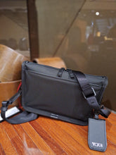 Load image into Gallery viewer, Tumi  convertible clutch crossbody black

